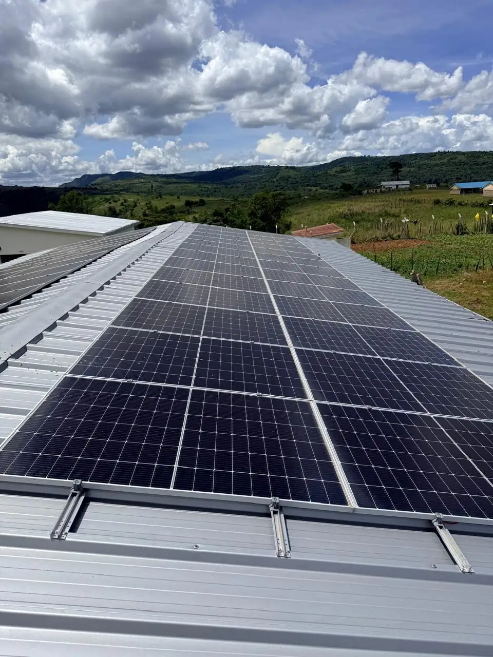 Solar panel array on rural school rooftop
