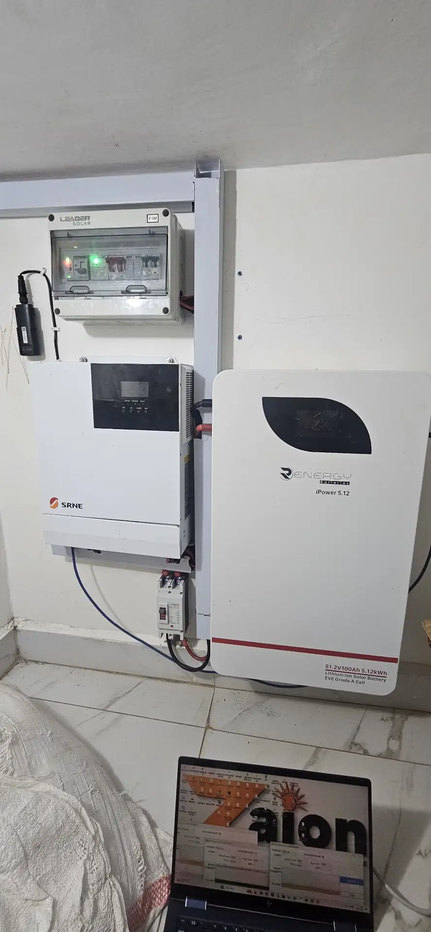 SRNE hybrid inverter being configured in the Renergy lab